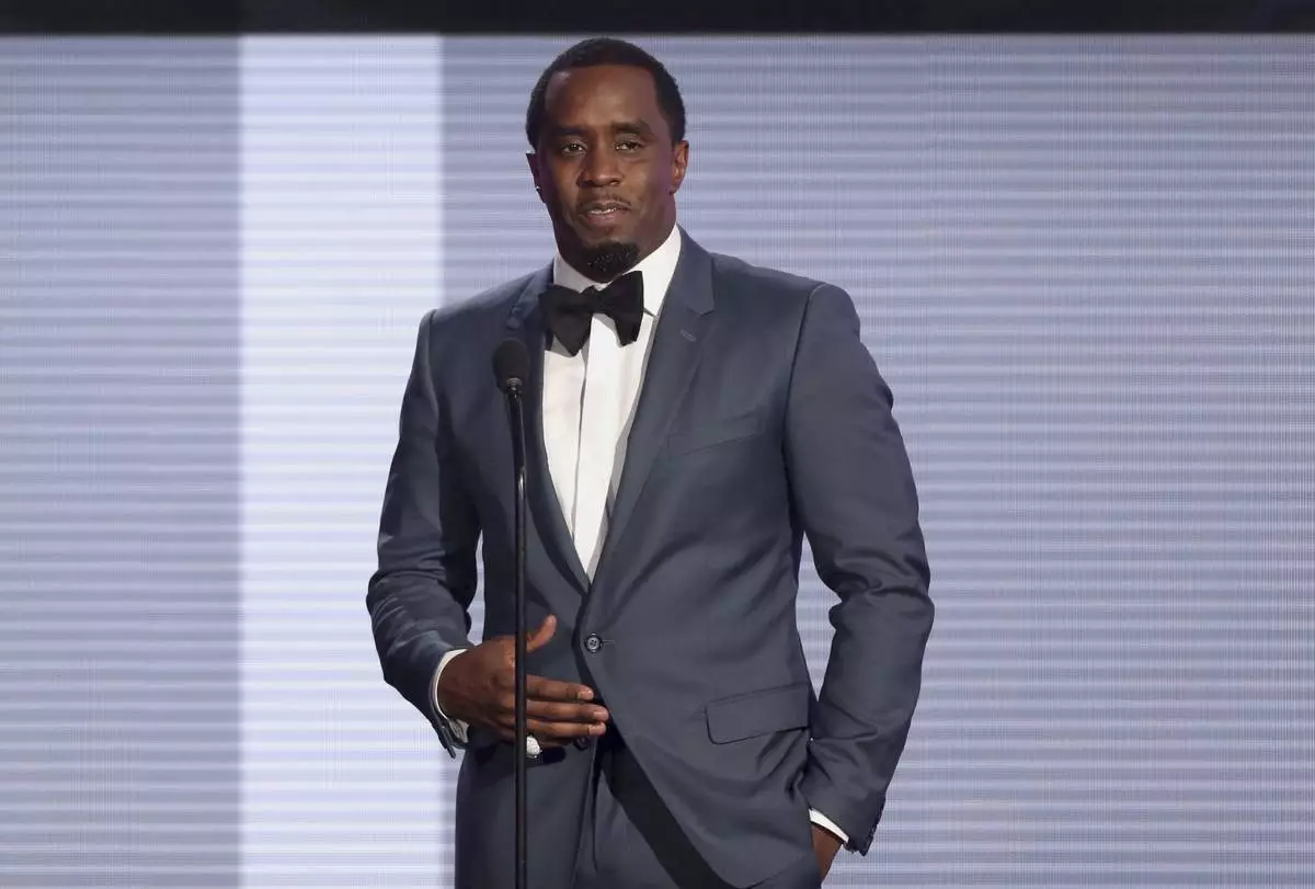 FILE - In this Nov. 22, 2015 file photo, Sean "Diddy" Combs presents the award for best collaboration of the year at the American Music Awards at the Microsoft Theater in Los Angeles. (Photo by Matt Sayles/Invision/AP, File)