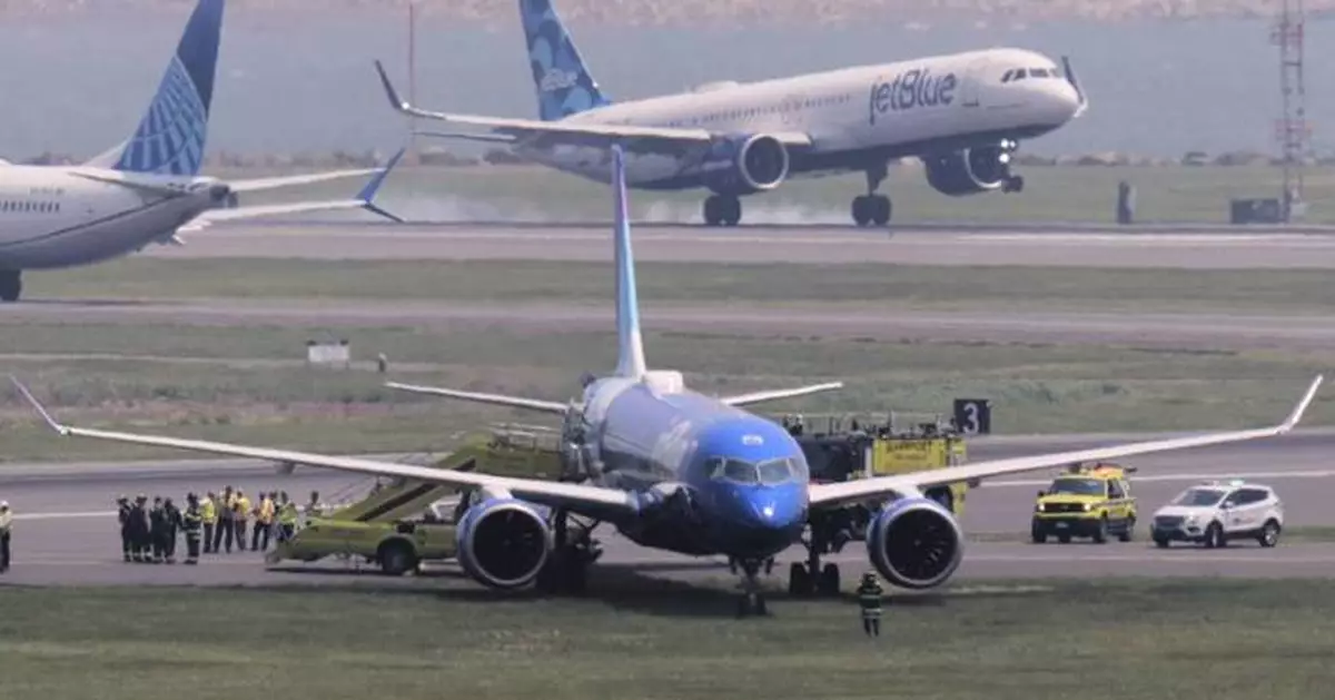 JetBlue flight from Chicago rolls off runway and into grass in Boston