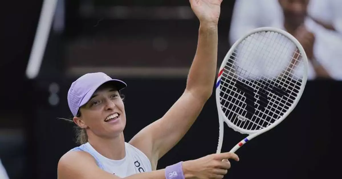 Swiatek routs Paolini in Hamburg for her first grass final. Pegula awaits