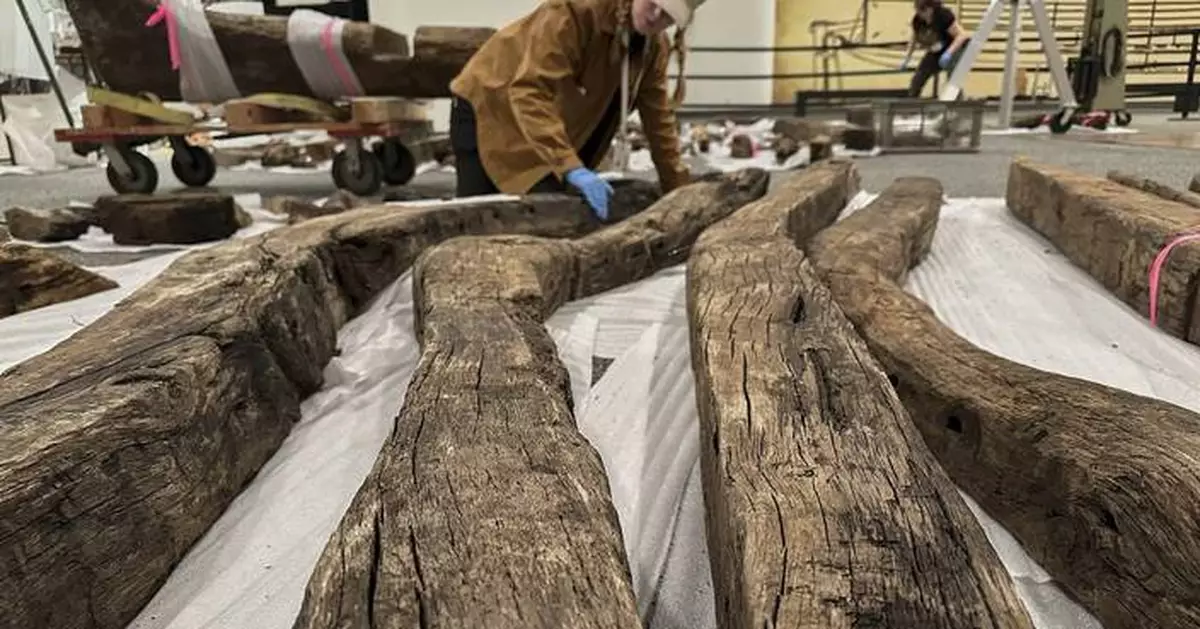 A Revolutionary War-era boat is being painstakingly rebuilt after centuries buried beneath Manhattan