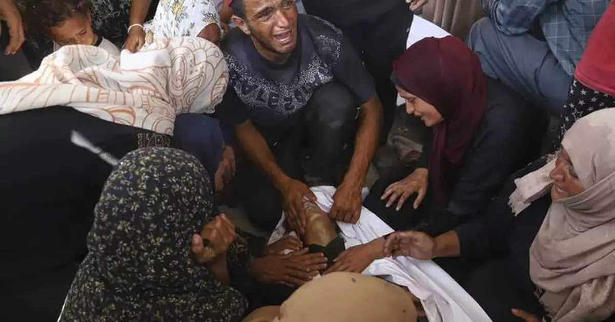 At least 51 Palestinians killed while waiting for aid trucks in Gaza, health officials say