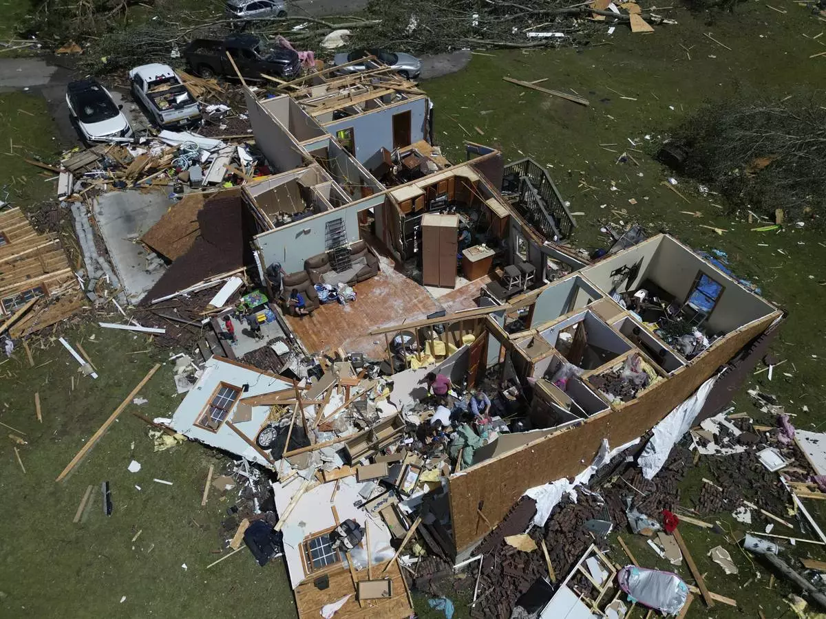 A home lays in ruins after a severe storm passed London, Kentucky, May 17, 2025. (AP Photo/Carolyn Kaster)