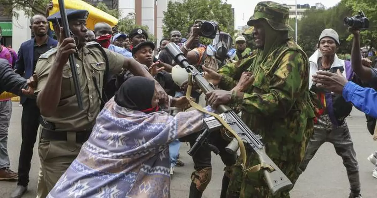 Kenyan police officer arrested after daylong protests over a blogger's death in custody