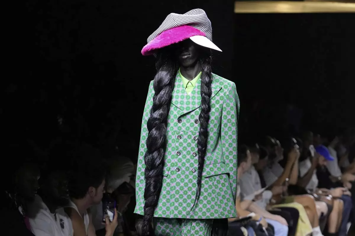 A model wears a creation part of the men's Comme des Garcons Homme Plus Spring-Summer 2026 collection, that was presented in Paris Friday, June 27, 2025. (AP Photo/Michel Euler)