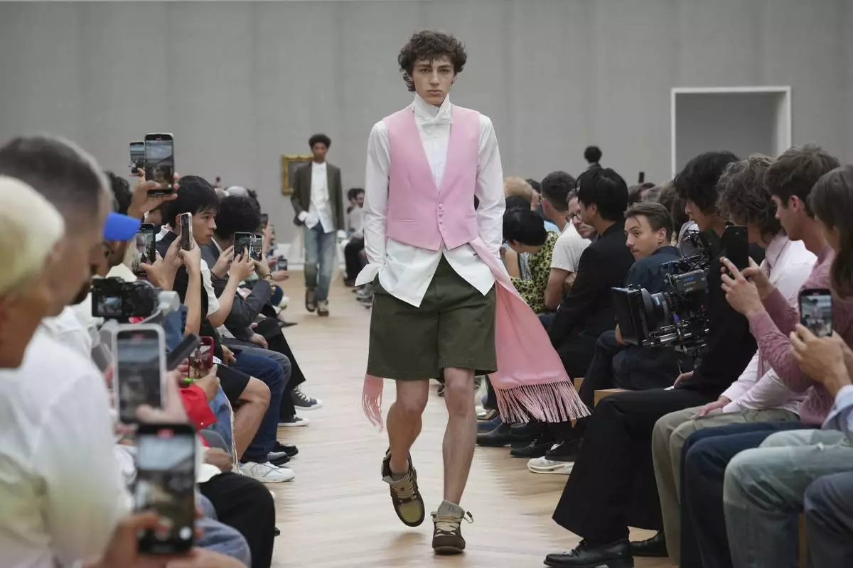 A model wears a creation for Dior Homme Spring-Summer 2026 collection, that was presented in Paris Friday, June 27, 2025. (AP Photo/Christophe Ena)