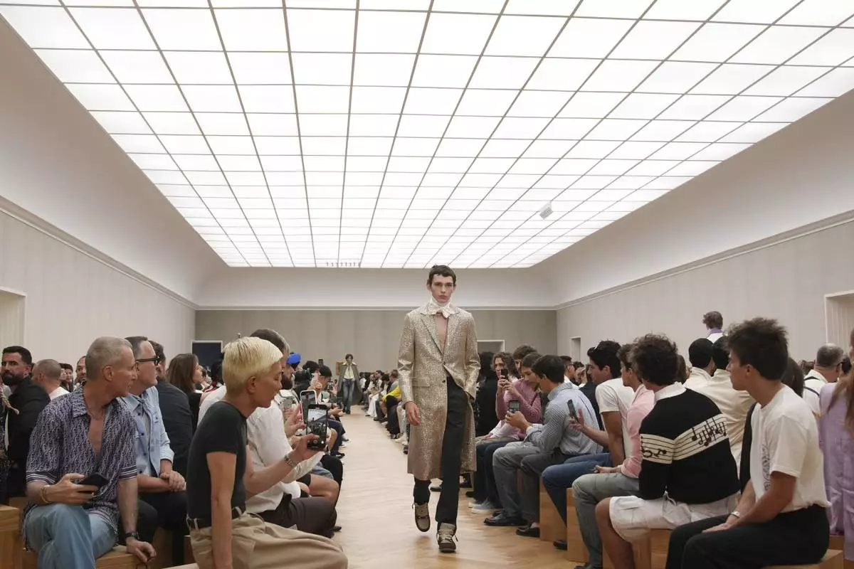 A model wears a creation for Dior Homme Spring-Summer 2026 collection, that was presented in Paris Friday, June 27, 2025. (AP Photo/Christophe Ena)