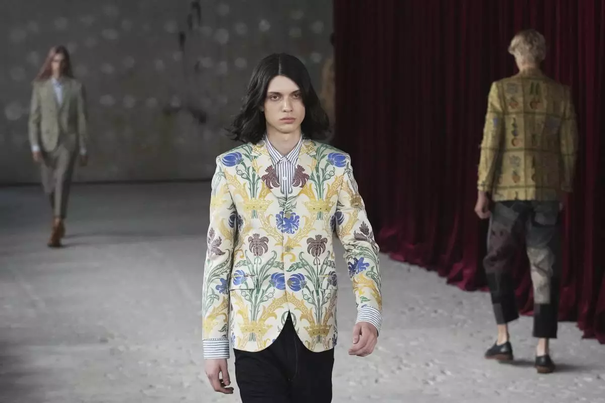 A model wears a creation part of the men's Junya Watanabe Spring-Summer 2026 collection, that was presented in Paris Friday, June 27, 2025. (AP Photo/Christophe Ena)