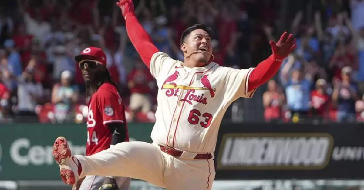 Yohel Pozo has RBI single in the 11th to give the Cardinals a 6-5 victory over the Reds