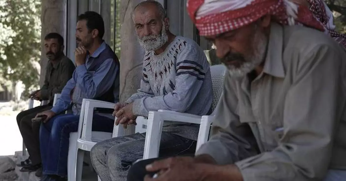 Israel raids a Syrian village and detains suspected militants; 1 person is killed