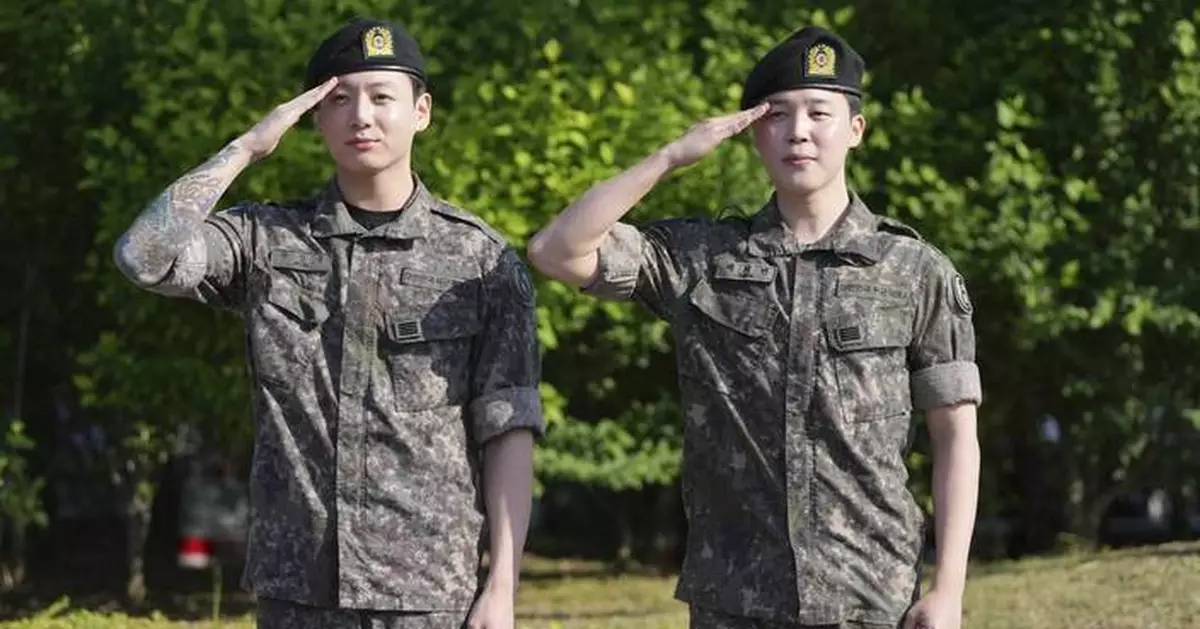 AP PHOTOS: BTS stars Jimin and Jung Kook discharged from military service
