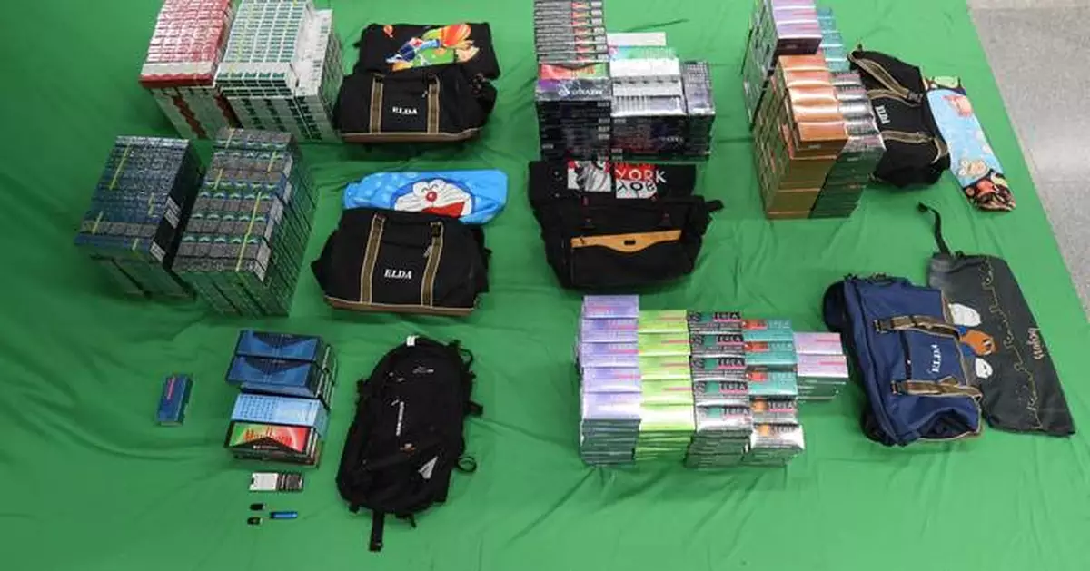 Two men sentenced for smuggling 57,000 illegal cigarettes and alternative smoking products at Hong Kong airport.