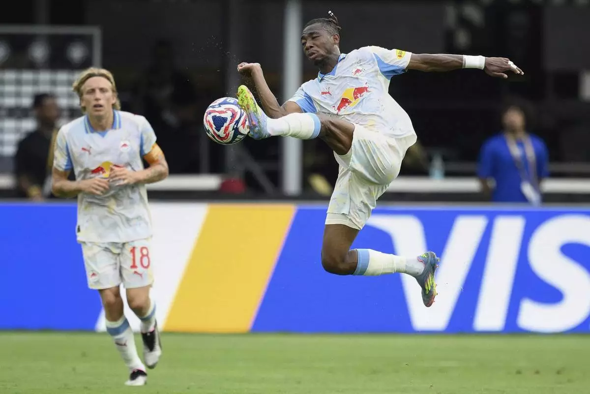 Red Bull Salzburg's Dorgeles Nene controls the ball during the Club World Cup Group H soccer match between Salzburg and Al Hilal in Washington, Sunday, June 22, 2025. (AP Photo/Nick Wass)