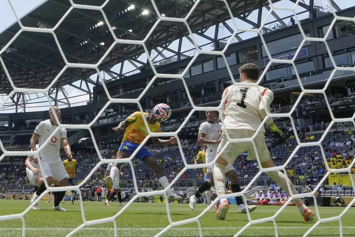 Mamelodi Sundowns' Iqraam Rayners (13) scores a goal during the Club World Cup Group F soccer match between Mamelodi Sundowns and Borussia Dortmund in Cincinnati, Saturday, June 21, 2025. (AP Photo/Carolyn Kaster)