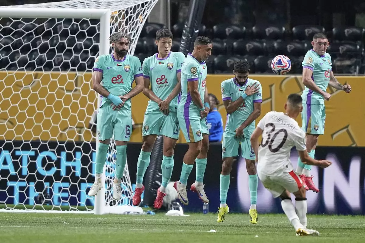 Manchester City's Claudio Echeverri (30) scores his side's second goal against Al Ain during the Club World Cup Group G soccer match between Manchester City and Al Ain in Atlanta, Sunday, June 22, 2025. (AP Photo/Brynn Anderson)