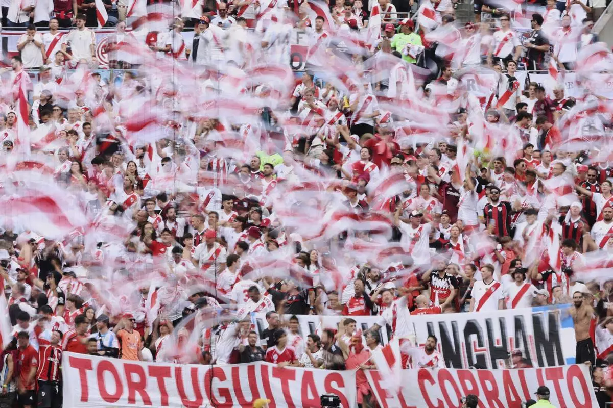 River Plate supporters wave flags ahead of the Club World Cup Group E soccer match between Inter Milan and River Plate in Seattle, Wednesday, June 25, 2025. (AP Photo/Ryan Sun)