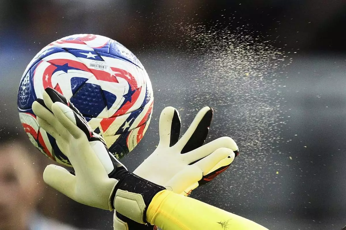Red Bull Salzburg's Christian Zawieschitzky makes a save during the Club World Cup Group H soccer match between Salzburg and Al Hilal in Washington, Sunday, June 22, 2025. (AP Photo/Nick Wass)