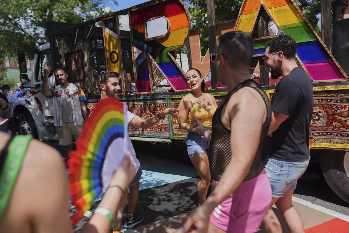 People of Iranian descent attend the World Pride Parade, Saturday, June 7, 2025, in Washington. (AP Photo/Jacquelyn Martin)