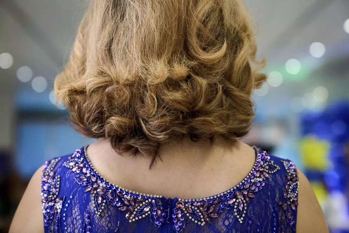 Bella Bautista, 22, a trans woman, attends an awards ceremony for the National Trans Visibility March, at the Human Rights Campaign headquarters, during World Pride, Friday, June 6, 2025, in Washington. (AP Photo/Jacquelyn Martin)