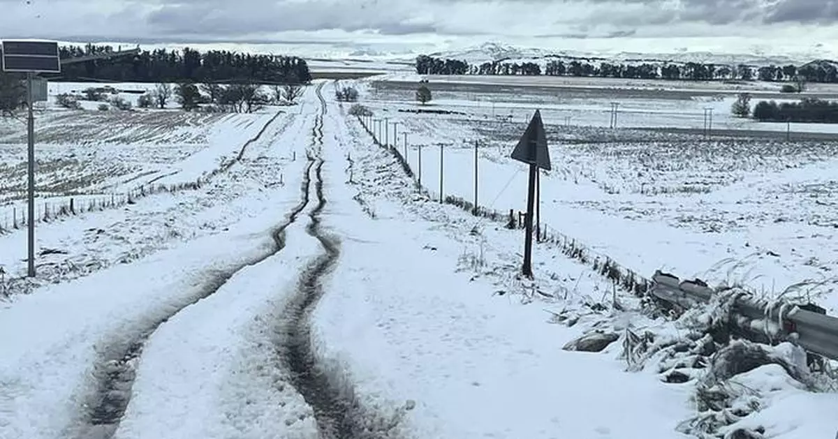 At least 7 people have died and schoolchildren were swept away as floods and snow hit South Africa