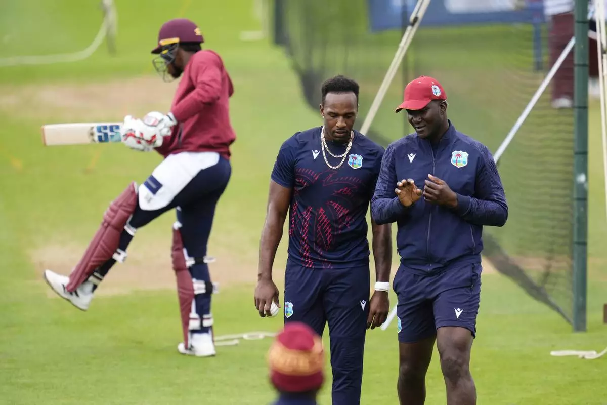 West Indies' head coach, right, Daren Sammy and Matthew Ford attend a nets session at Sophia Gardens, Cardiff, Wales, Saturday May 31, 2025. (Nick Potts/PA via AP)