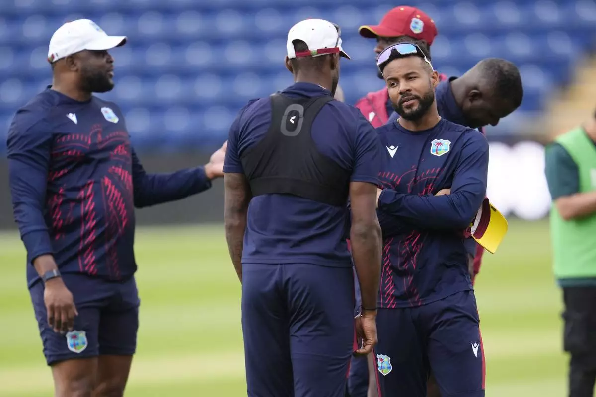 West Indies' Shai Hope, right, attends a nets session at Sophia Gardens, Cardiff, Wales, Saturday May 31, 2025. (Nick Potts/PA via AP)