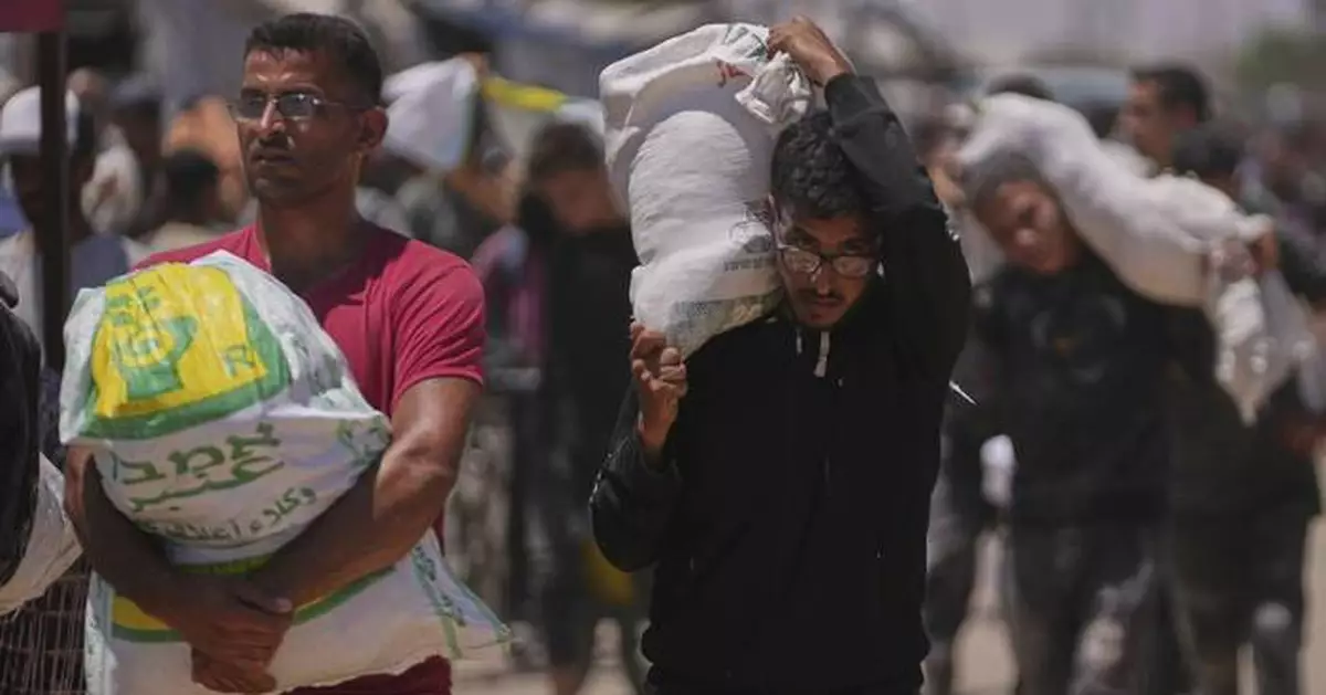 An Israeli strike kills 18 Palestinians in central Gaza as turmoil mounts over food distribution