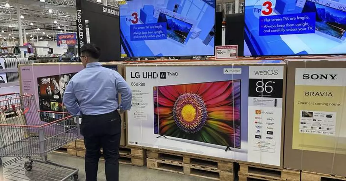 Gloomy Americans cut back on spending as inflation ticks higher