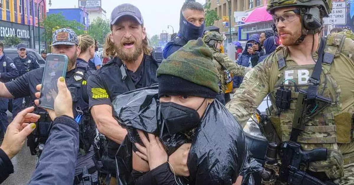 Federal officers in tactical gear went into a Latino community in Minneapolis. A protest followed