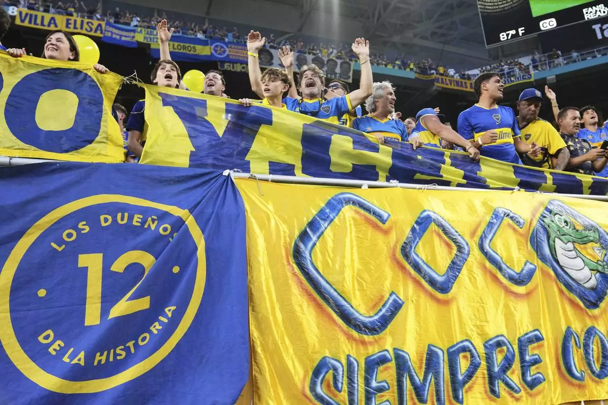 Boca Juniors fans react ahead of the Club World Cup Group C soccer match between Bayern Munich and Boca Juniors in Miami Gardens, Fla., Friday, June 20, 2025. (AP Photo/Lynne Sladky)