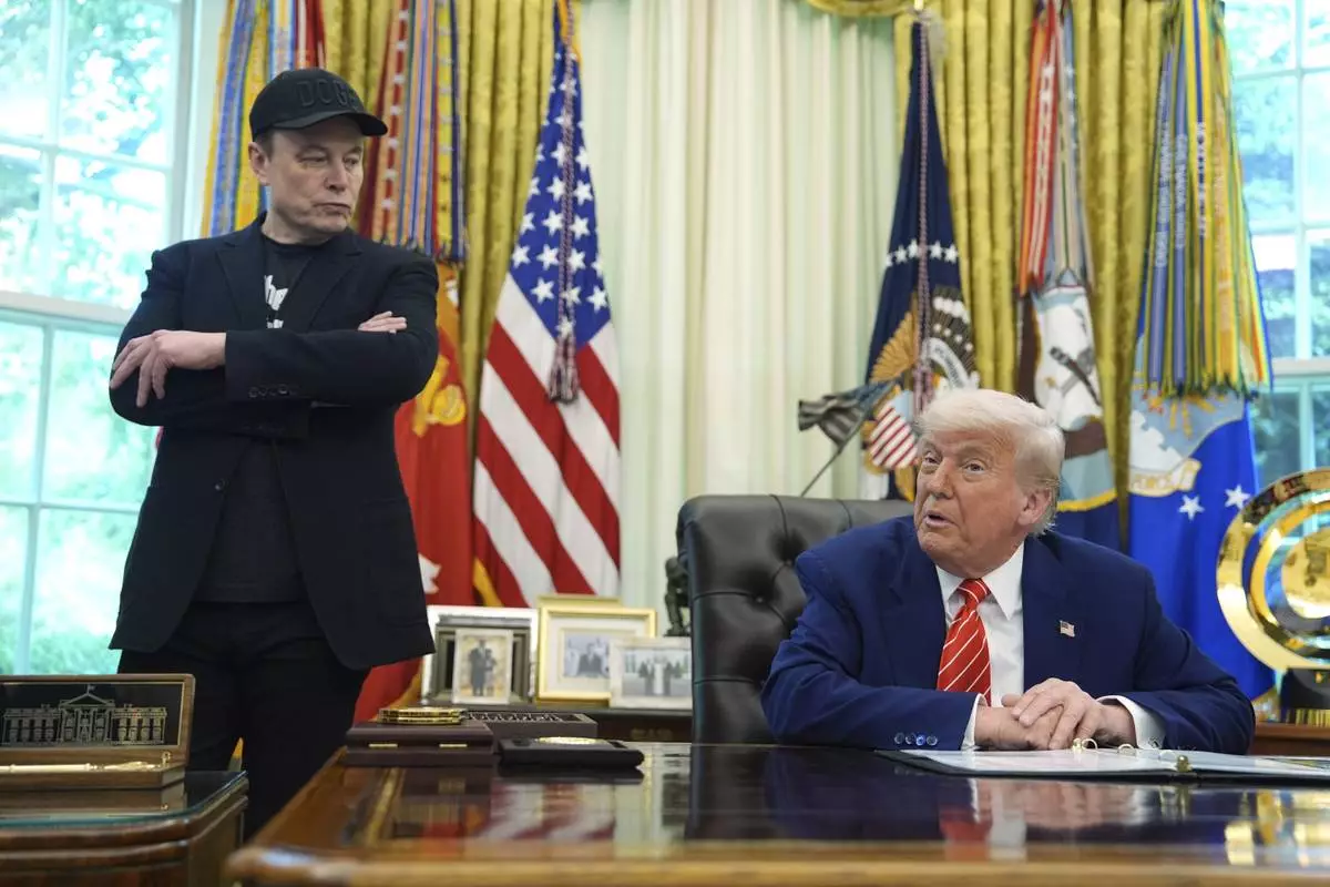 President Donald Trump speaks during a news conference with Elon Musk in the Oval Office of the White House, Friday, May 30, 2025, in Washington. (AP Photo/Evan Vucci)