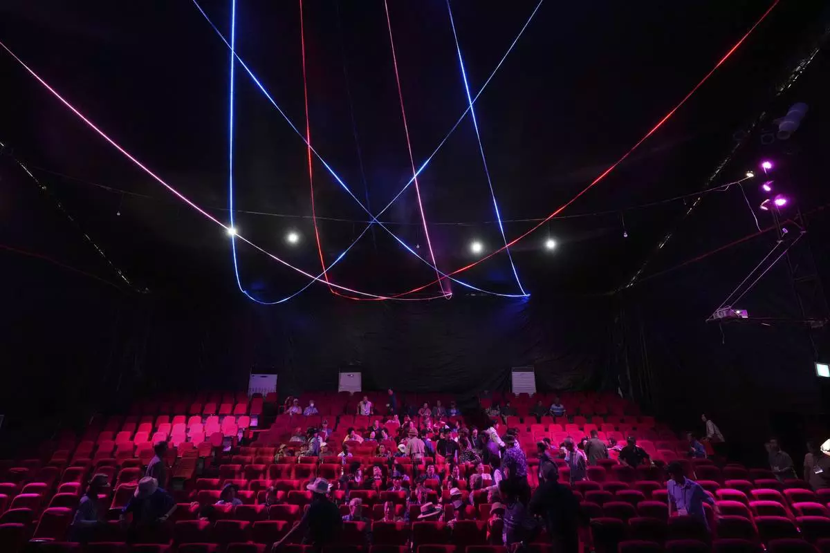 Spectators arrive at the big top of Dongchoon Circus Troupe in Ansan, South Korea, Tuesday, June 10, 2025. (AP Photo/Lee Jin-man)