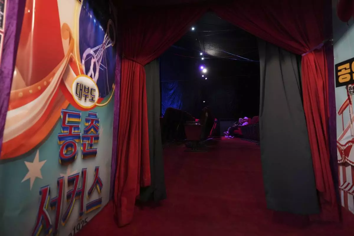 Spectators wait for the start of a performance at the big top of Dongchoon Circus Troupe, South Korea's last-remaining circus, in Ansan, South Korea, Tuesday, June 10, 2025. (AP Photo/Lee Jin-man)