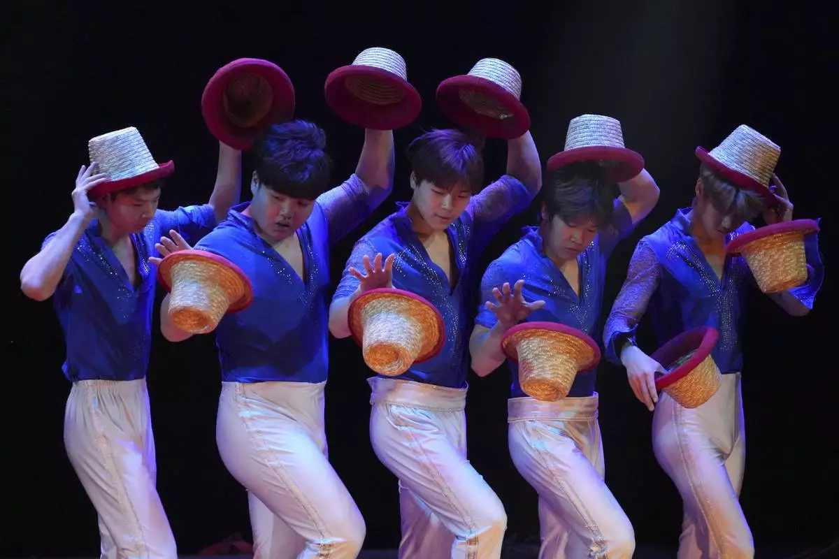 Acrobats from Dongchoon Circus Troupe perform during a daily regular performance in Ansan, South Korea, Wednesday, June 11, 2025. (AP Photo/Lee Jin-man)