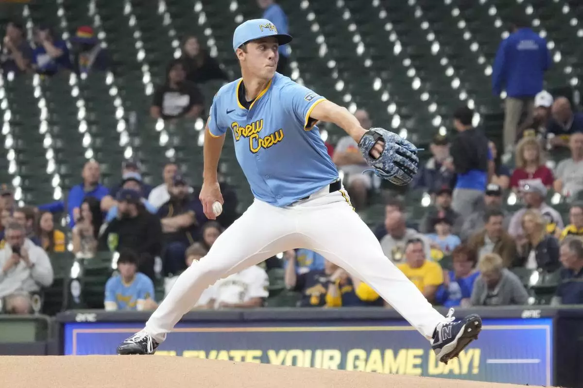 Milwaukee Brewers pitcher Jacob Misiorowski throws against St. Louis Cardinals' Lars Nootbaar as he makes his major league debut during the first inning of a baseball game Thursday, June 12, 2025, in Milwaukee. (AP Photo/Kayla Wolf)