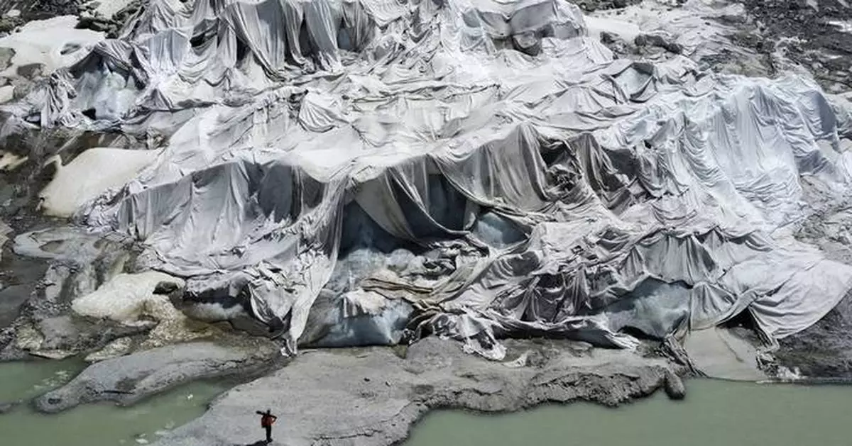 See photos of a Swiss glacier melting in the heat of climate change