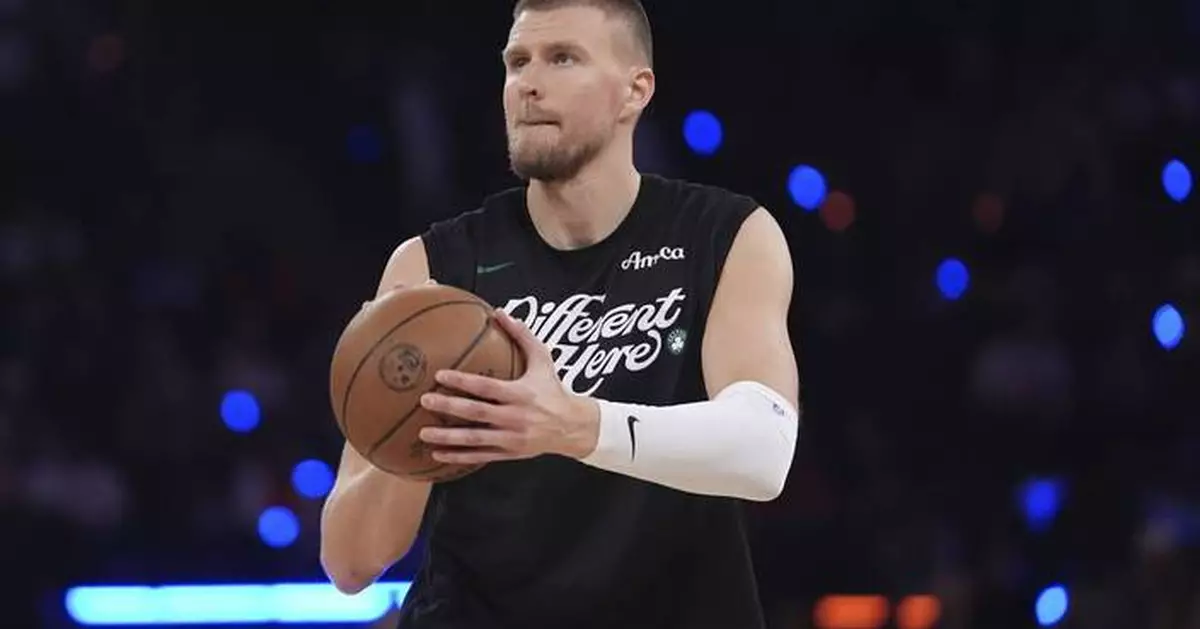 Porzingis going to Hawks in a 3-team trade agreement, AP source says