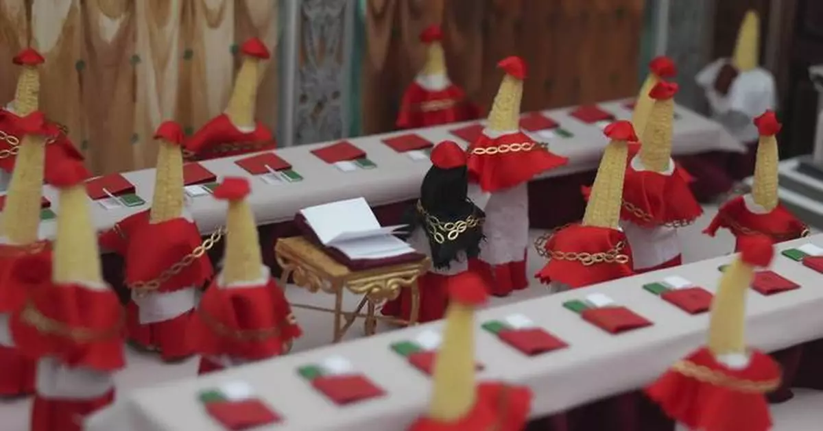 A quirky vegetable sculpture contest features a squash Donald Trump and a papal 'Cornclave'