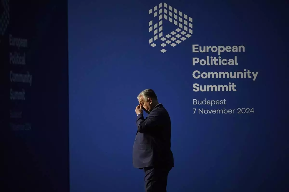 FILE - Hungary's Prime Minister Viktor Orban waits for the arrival of leaders for the European Political Community (EPC) Summit at the Puskas Arena in Budapest, Hungary, Thursday, Nov. 7, 2024. (AP Photo/Petr David Josek, File)