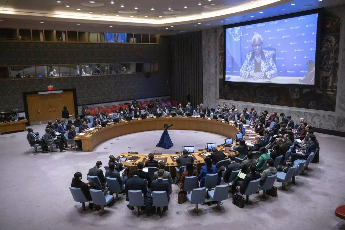 FILE - A large screen shows Special Representative of the Secretary-General in the Democratic Republic of the Congo Bintou Keita as she speaks during a Security Council meeting at the United Nations headquarters, Jan. 26, 2025. (AP Photo/Yuki Iwamura, File)