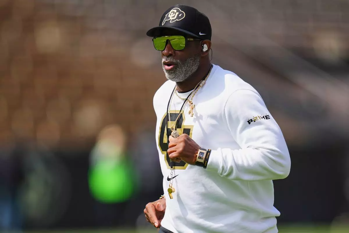 FILE - Colorado head coach Deion Sanders takes the field during an NCAA college football spring game, Saturday, April 19, 2025, in Boulder, Colo. (AP PhotoJack Dempsey, File)