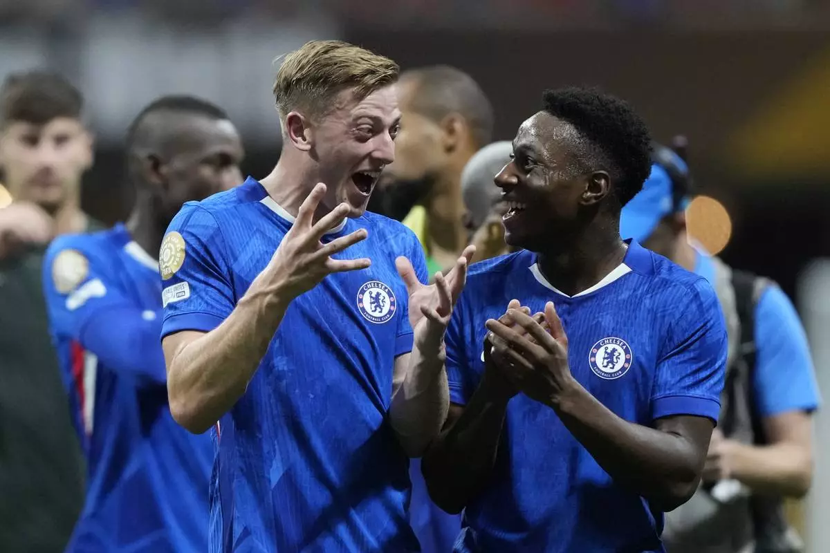 Chelsea's Liam Delap, left, celebrates at the end of the Club World Cup group D soccer match between Chelsea and Los Angeles FC in Atlanta, Monday, June 16, 2025. (AP Photo/Brynn Anderson)