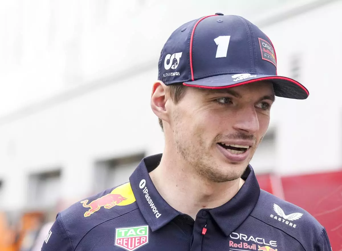 Red Bull Racing driver Max Verstappen, of the Netherlands, walks through the paddocks at the F1 Canadian Grand Prix auto race in Montreal, Thursday, June 12, 2025. (Christinne Muschi/The Canadian Press via AP)
