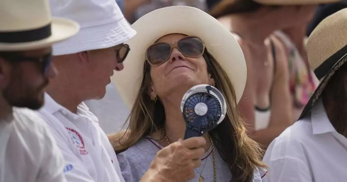 Photos of Western Europeans coping with the year's first heat wave