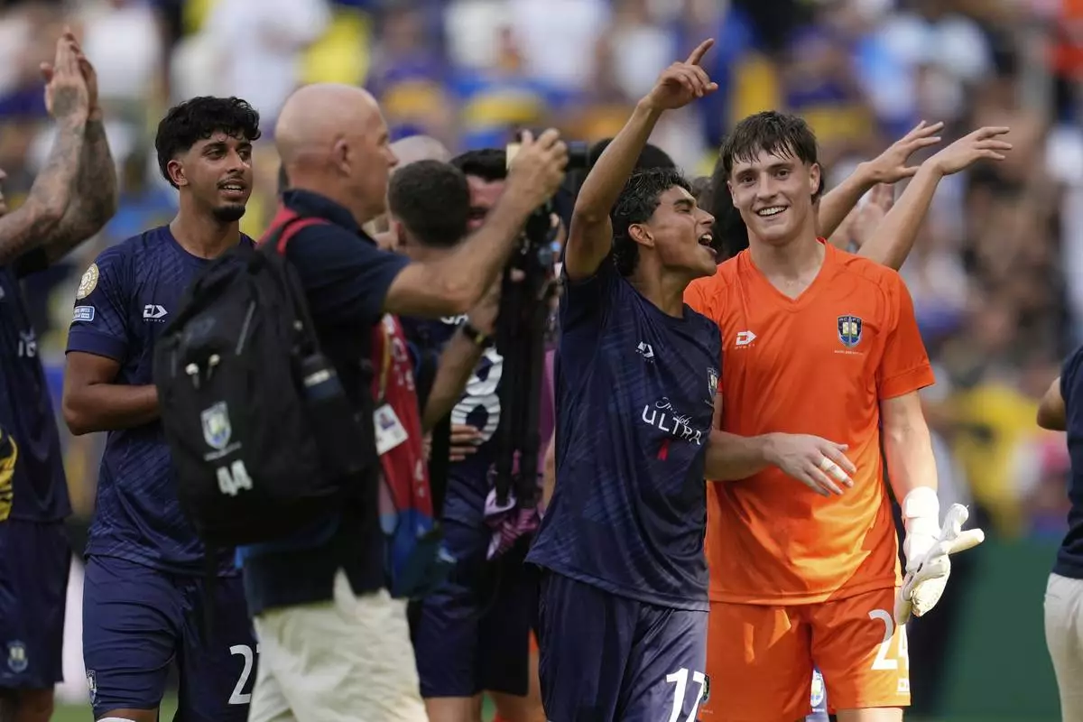 Auckland City's Nathan Garrow, right, and Auckland City's Jerson Lagos celebrate after the Club World Cup Group C soccer match between Auckland City and Boca Juniors in Nashville, Tenn., Tuesday, June 24, 2025. (AP Photo/George Walker IV)
