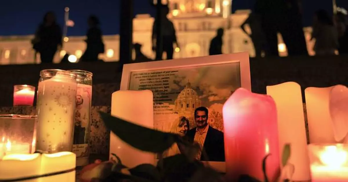 Photos of candlelight vigil honoring slain Minnesota lawmaker and her husband
