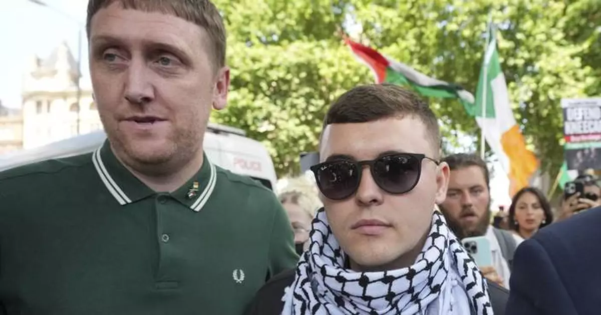 Irish rap group Kneecap plays for a big Glastonbury crowd despite criticism