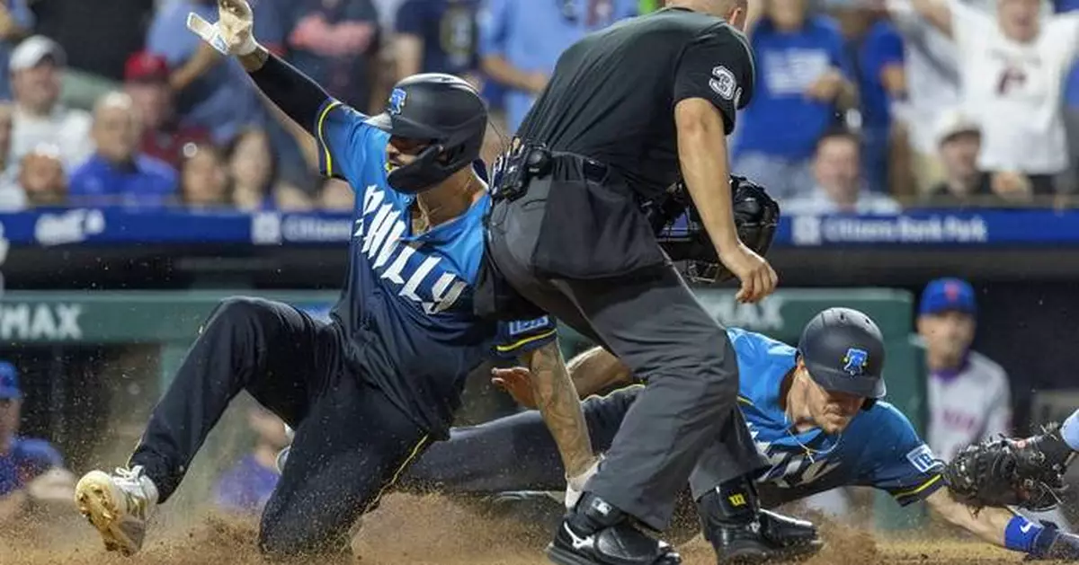 Phillies surge past Mets with six-run seventh inning, claim first place in NL East