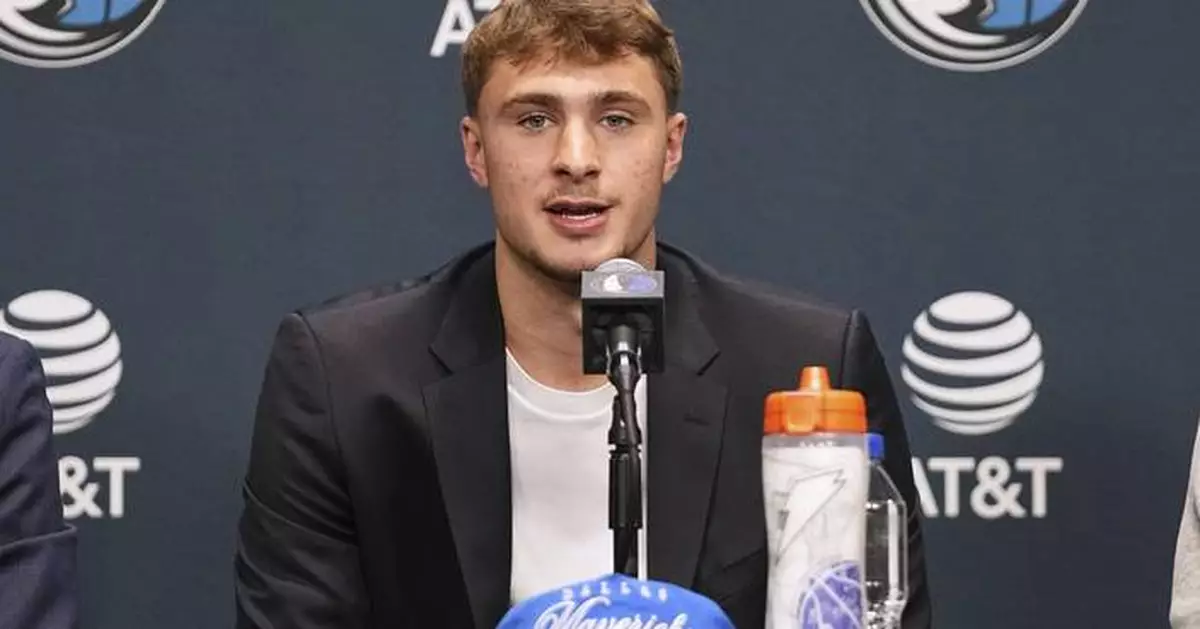 Cooper Flagg looks comfortable in new home as No. 1 pick gets introduced in Dallas