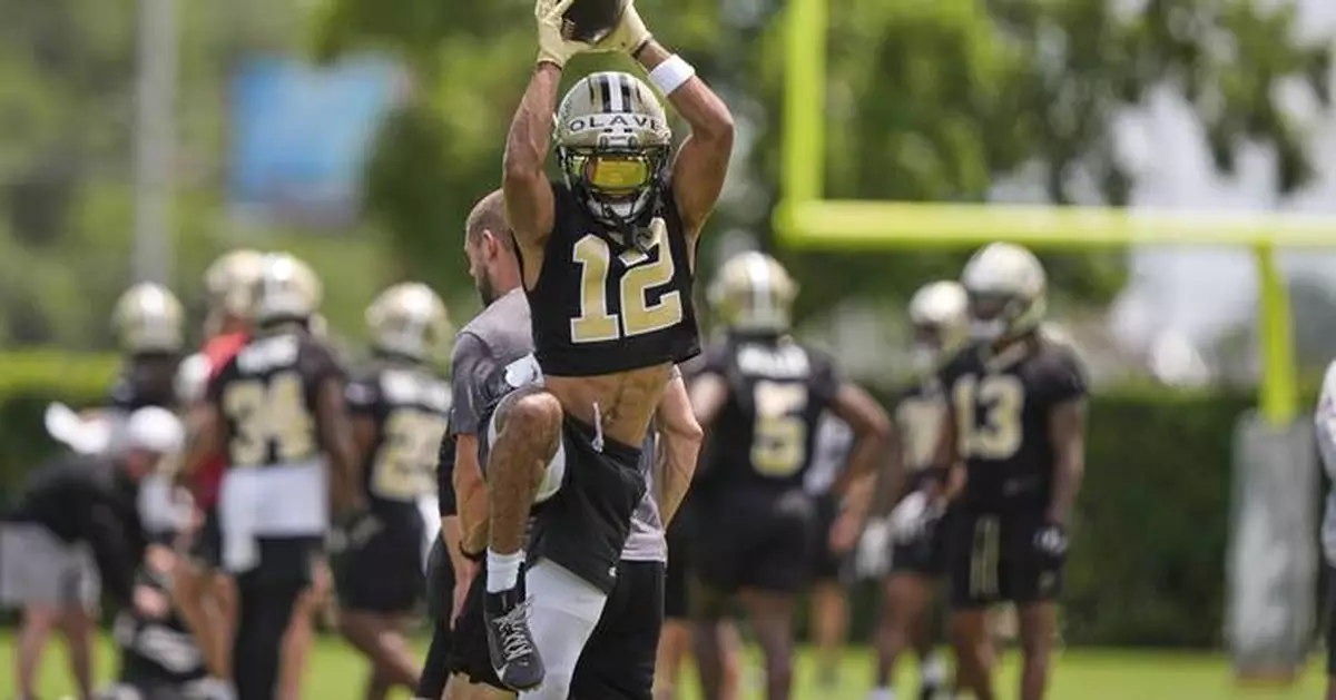Saints receiver Chris Olave brushes off concussion concerns and laughs off trade talk