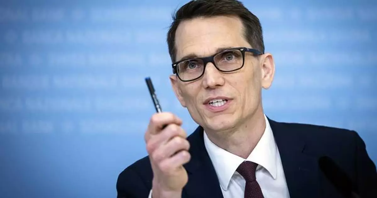 Swiss cut key interest rate by a quarter percentage point, putting its target now at 0%